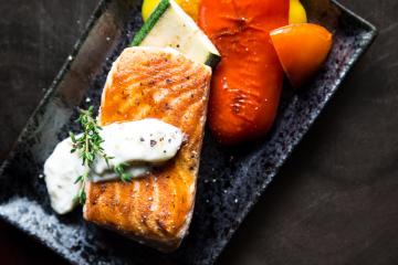 grilled-salmon-fish-on-rectangular-black-ceramic-plate-842142.jpg