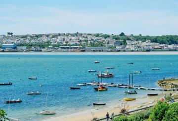 Boats on the sparkling blue water at Rock.