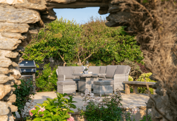 A round arched wall in a garden